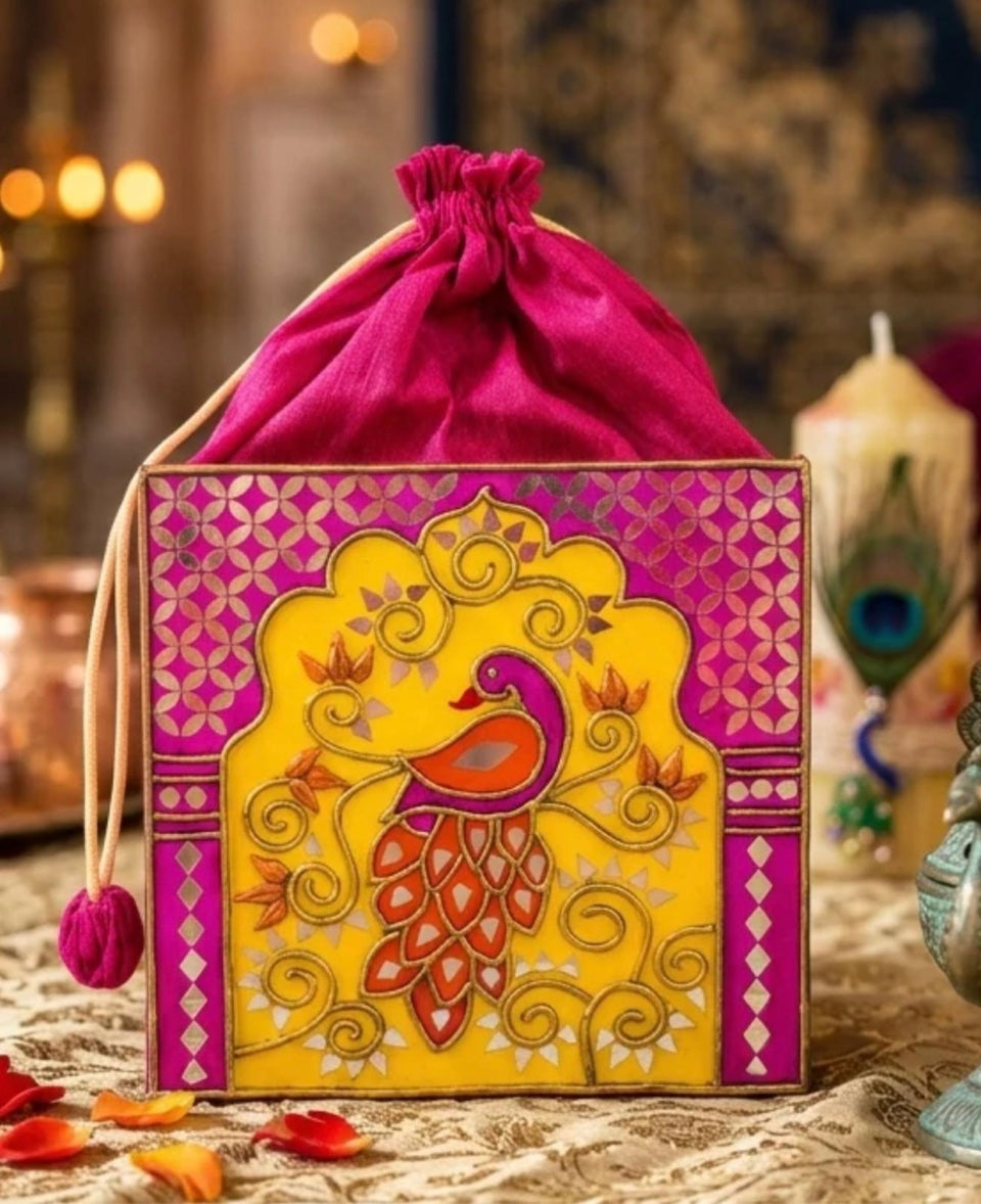 Royal Peacock Potli - Magenta and Yellow Lippan Art